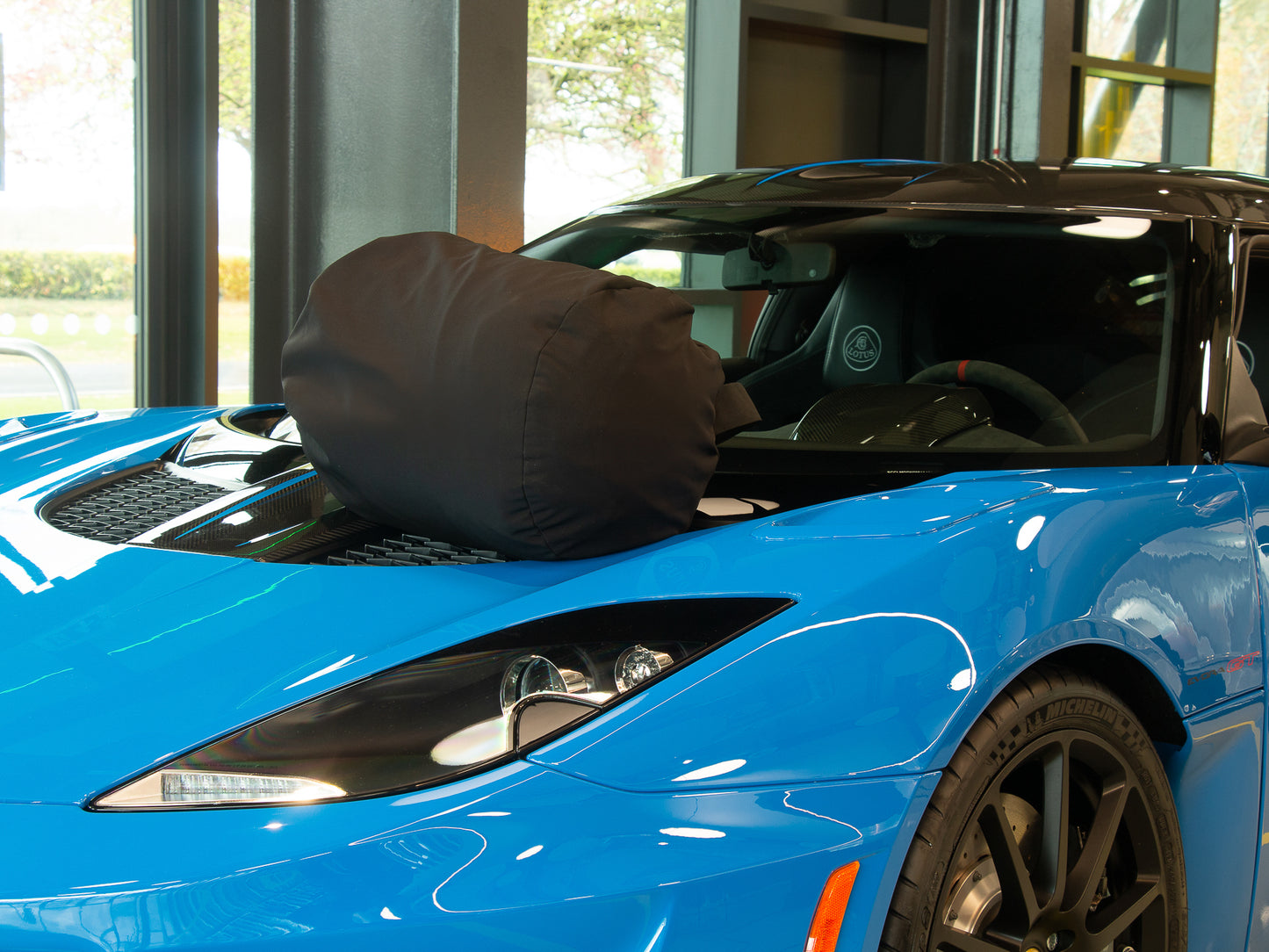 Lotus Evora autohoes voor binnen